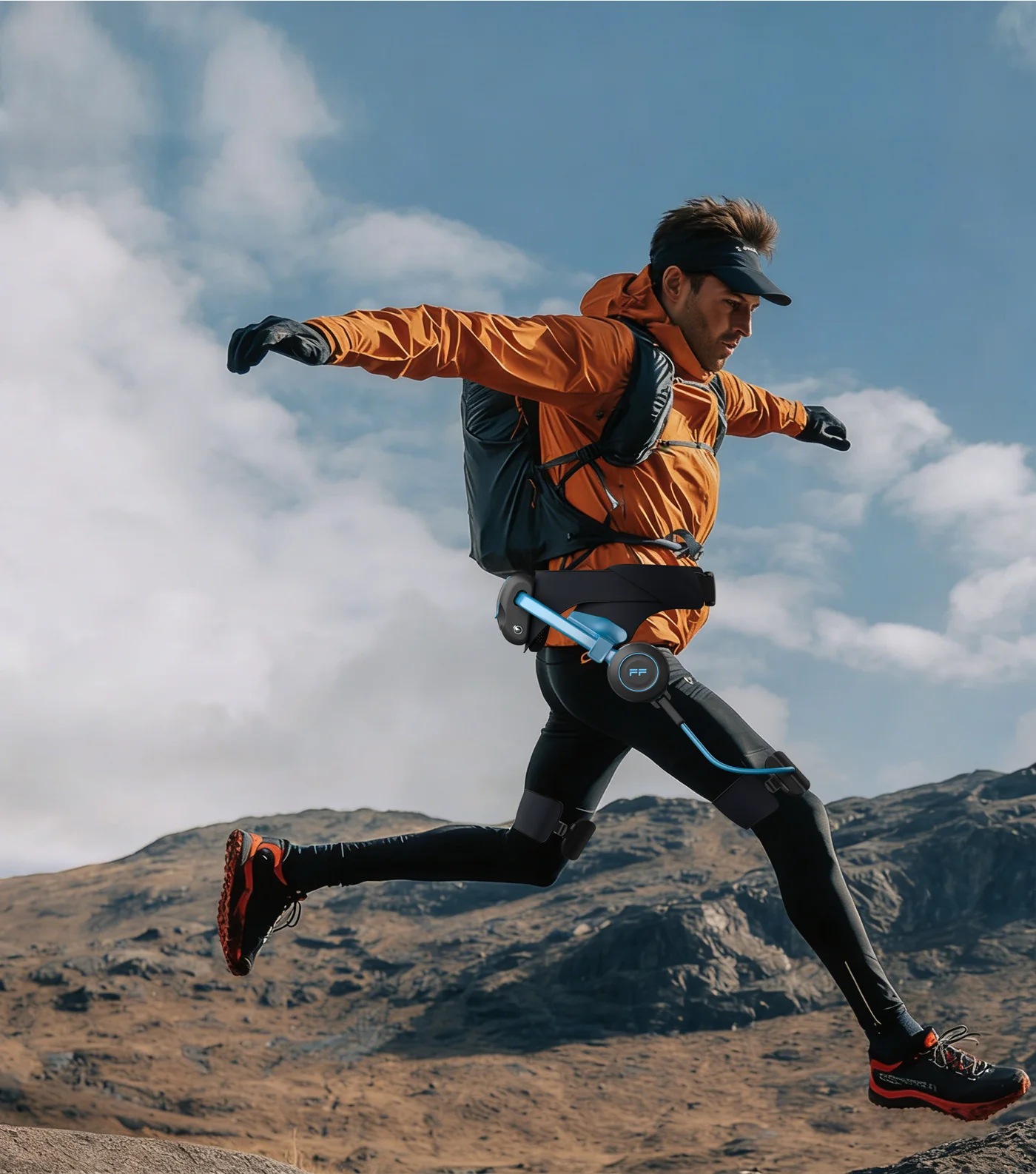 Runner wearing the Free GO lightweight exoskeleton in mountain terrain